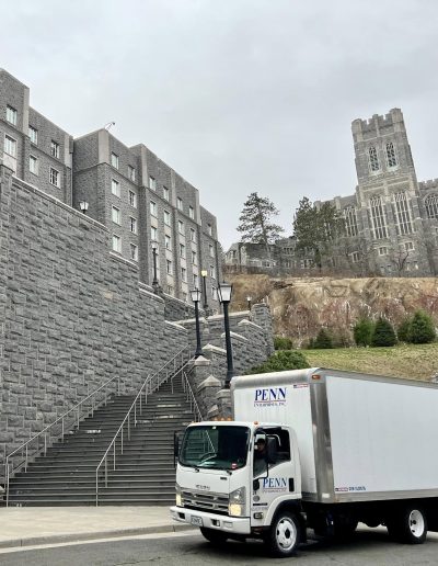 Stone building with truck and stairs